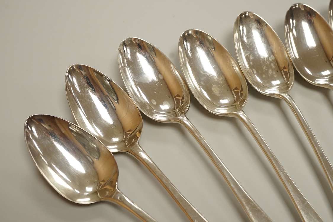 Eleven assorted 19th century silver Old English pattern dessert spoons, various dates and makers, 15.5oz.